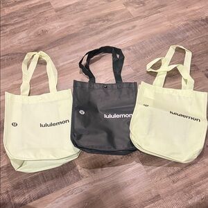 Lightly used lululemon athletica dark green and light lime green Tote Trio